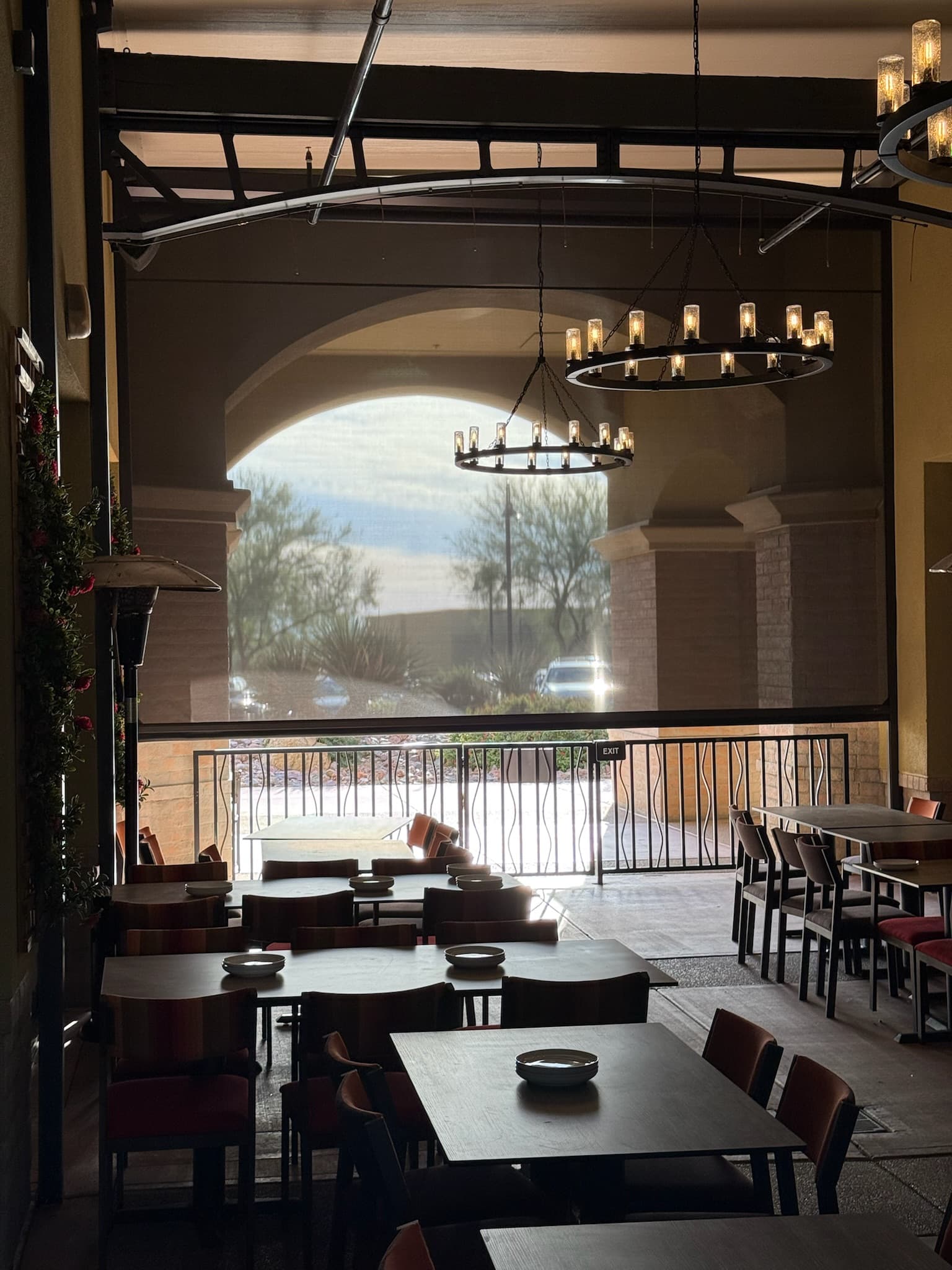 Large retained patio screen system installed on a Phoenix opening